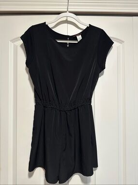 Mark black lightweight romper with open back keyhole feature